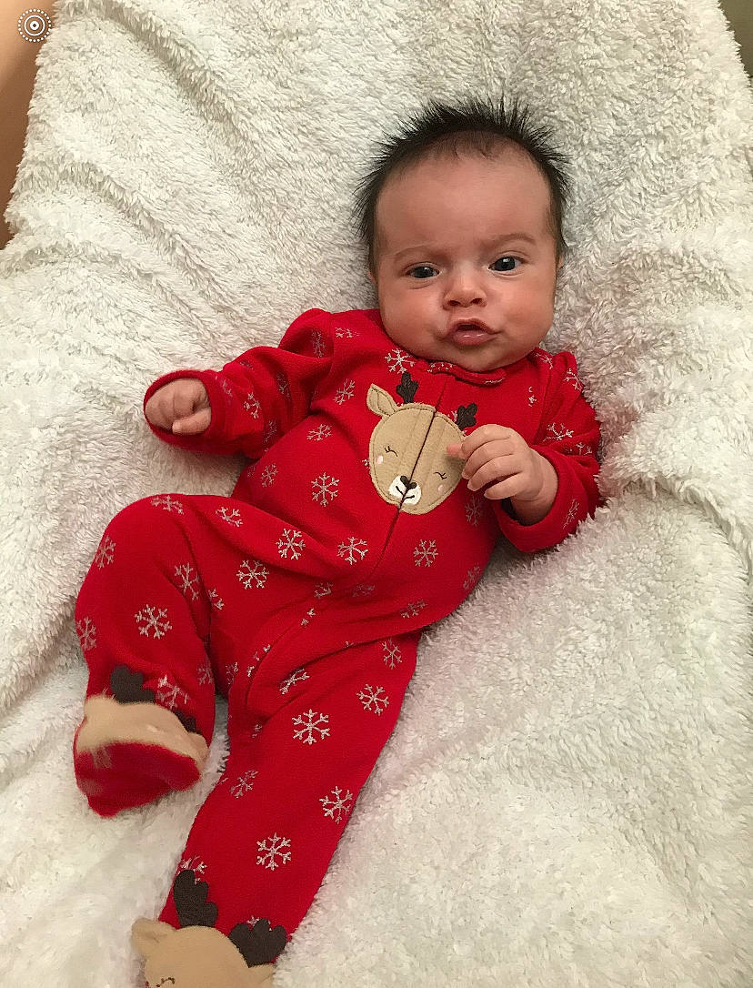 Amira joined the competition — help win amazing prizes! baby, cheek, child, face, head, lip, outerwear, person, red, skin, toddler