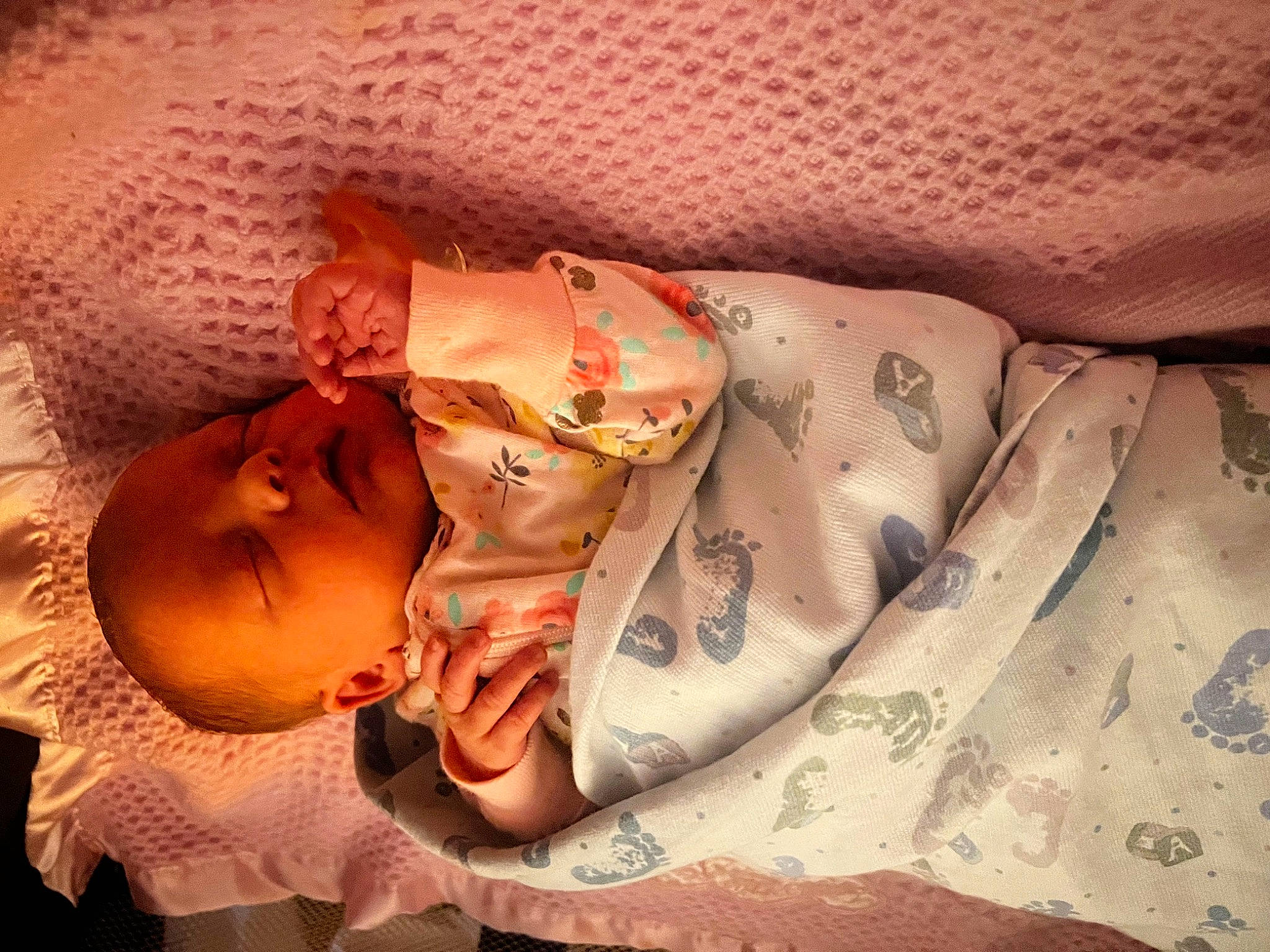 Ashtyn is registered to the contest to win money with this photo: abdomen, arm, baby, baby_products, baby_toddler_clothing, bedtime, chest, child, comfort, dress, human_body, human_leg, linens, mouth, pattern, person, skin, textile, thigh, toddler