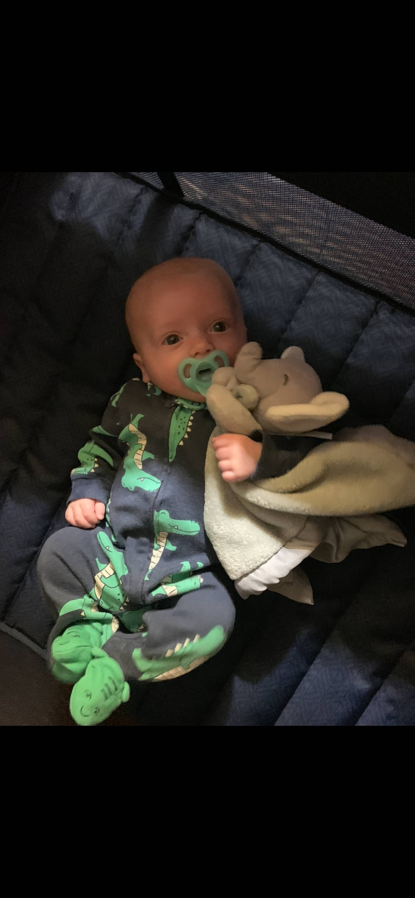 Wade joined the competition — help win amazing prizes! baby, baby_products, baby_toddler_clothing, cheek, child, comfort, darkness, finger, foot, fun, gesture, lap, nail, person, room, sitting, stuffed_toy, thumb, toddler, toy