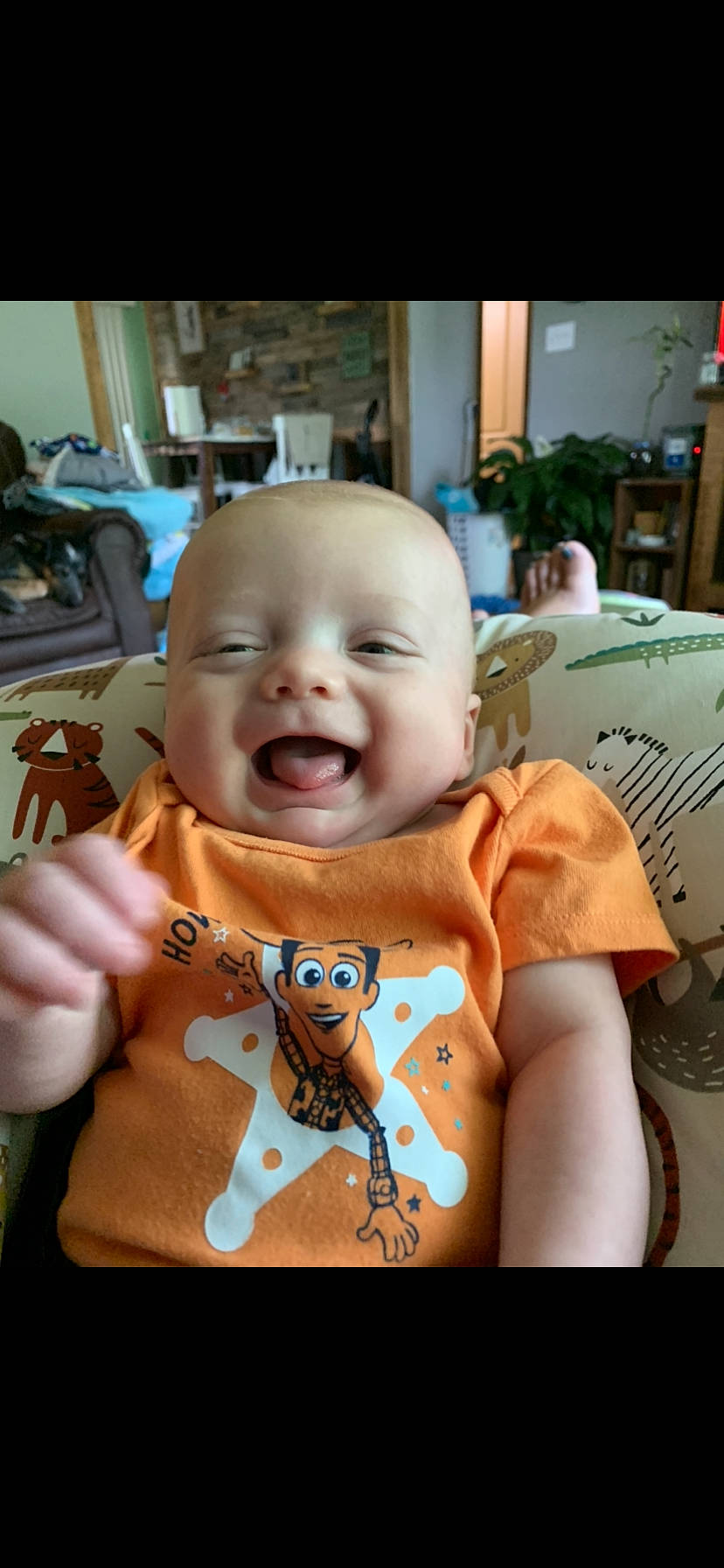 Wade joined the competition — help win amazing prizes! baby, baby_products, baby_toddler_clothing, chair, cheek, child, event, eye, fun, happy, laugh, mouth, person, room, sitting, skin, sleeve, smile, t_shirt, toddler