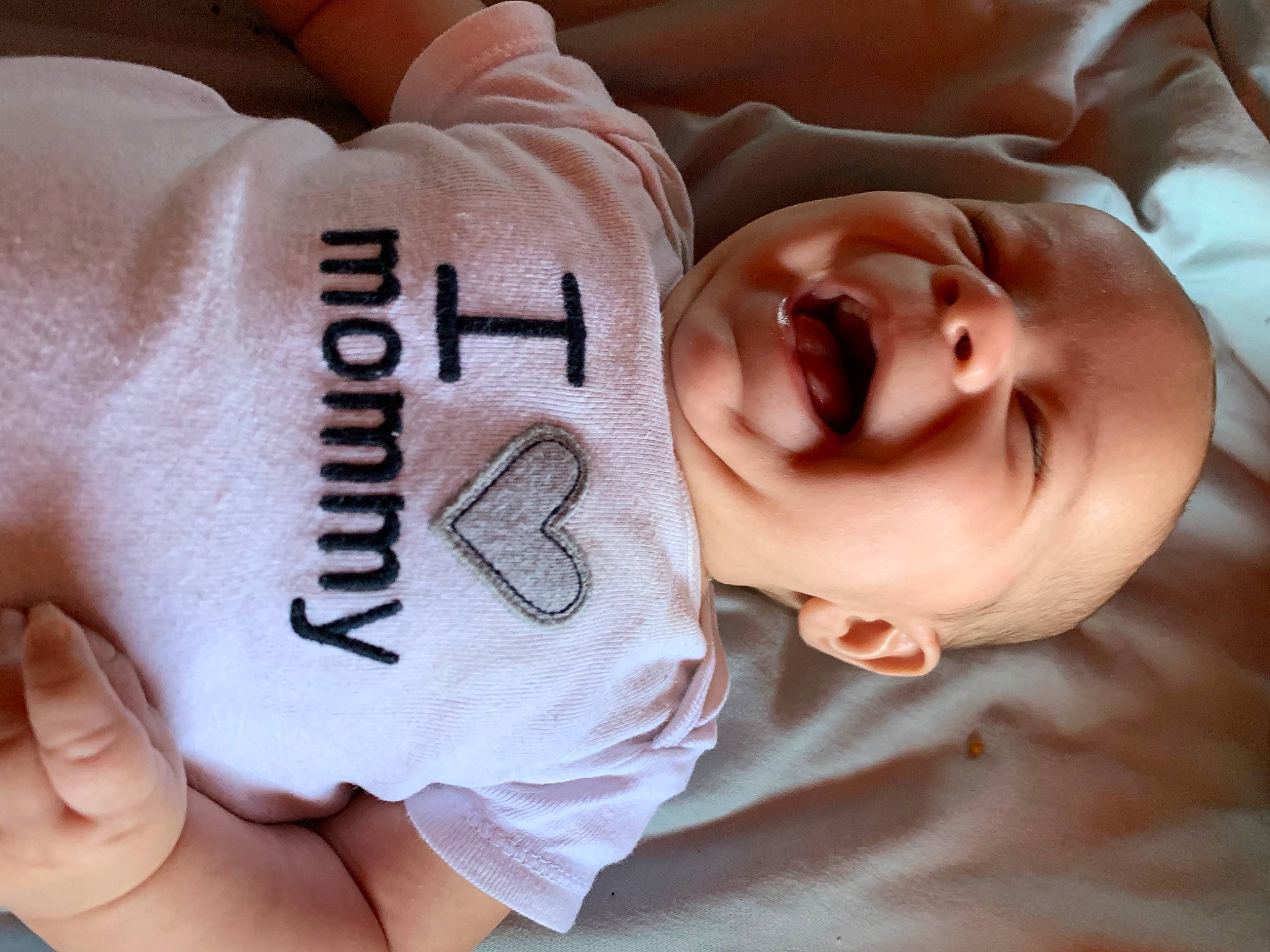 Dexter is registered to the contest to win money with this photo: baby, baby_sleeping, bedtime, birth, cheek, child, facial_expression, finger, gesture, hand, happy, human, love, mouth, nap, person, smile