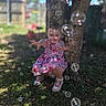 Diamond joined the competition — help win amazing prizes! child, toddler, pink_dress, minnie_mouse, bubbles, tree, grass, outdoor, sunlight, playful, happy, crouching, nature, shoes, young_child, daylight, smiling, reaching, fun, background_blur