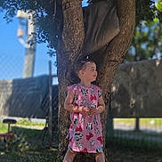 Diamond joined the competition — help win amazing prizes! background_blur, casual_clothing, child, daylight, fence, girl, grass, hairclip, happy, nature, outdoor, pink_dress, playful, portrait, shadow, shoes, smiling, standing, sunlight, tree