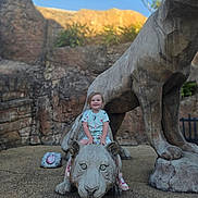 Diamond joined the competition — help win amazing prizes! child, statue, stone, big_cat, smile, outdoor, rock, playground, happy, person, footwear, clothing, nature, daylight, sculpture, young_child, casual, concrete, fun, adventure