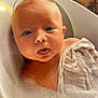 Hunter-Eli is registered to the contest to win money with this photo: baby, bathtub, bubbles, child, foam, face, hair, head, infant, inside, person, playful, portrait, skin, towel, water, wet, young, cute, expression