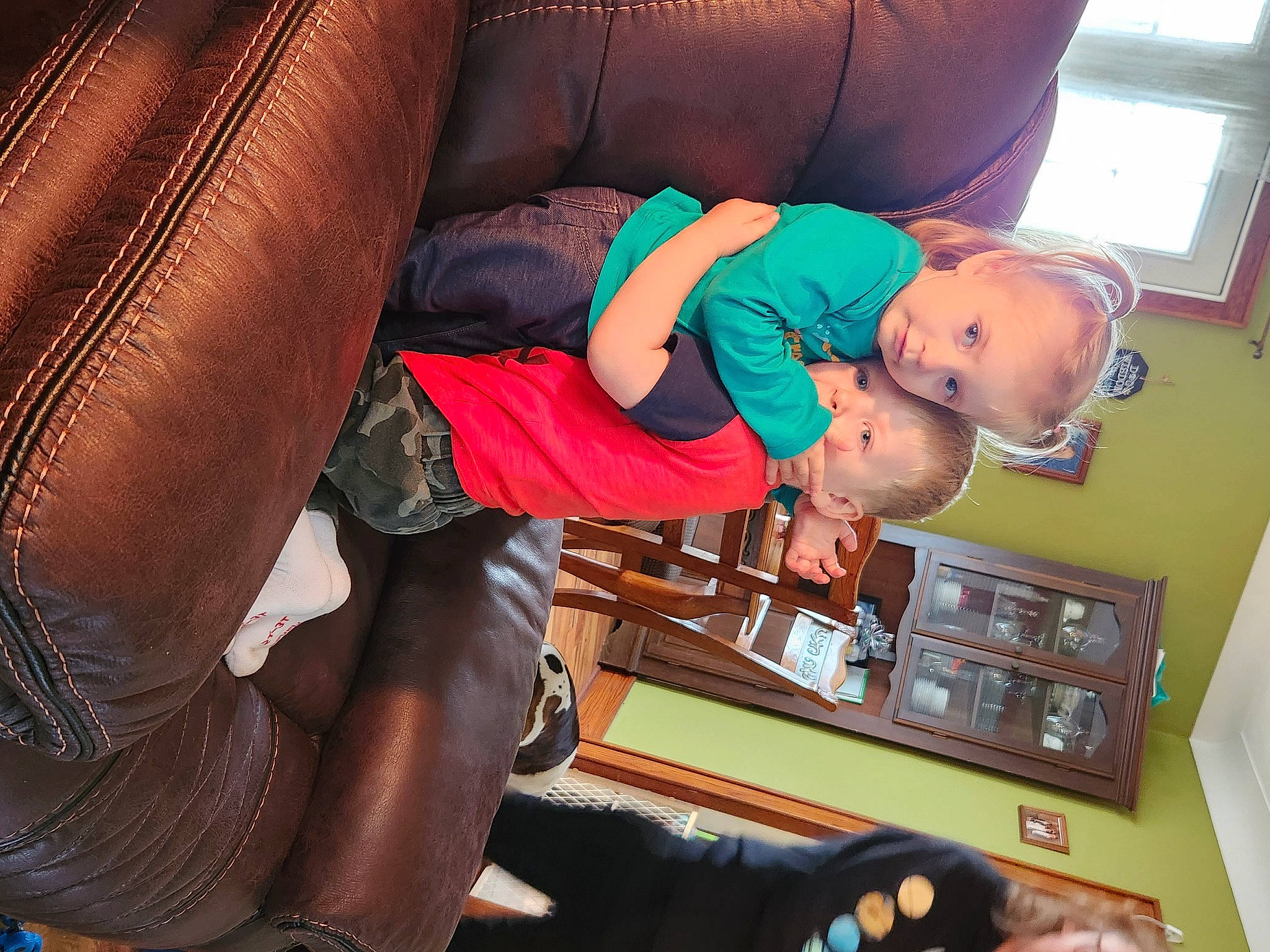 Eleanor is registered to the contest to win money with this photo: baby, child, comfort, couch, elbow, finger, foot, fun, hand, human_leg, joint, knee, lap, nail, person, play, room, sitting, thigh, thumb