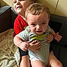 Princeston joined the competition — help win amazing prizes! child, baby, toddler, smiling, upset, couch, blanket, indoor, person, holding, sitting, clothing, face, hair, skin, furniture, expression, comfort, family, together
