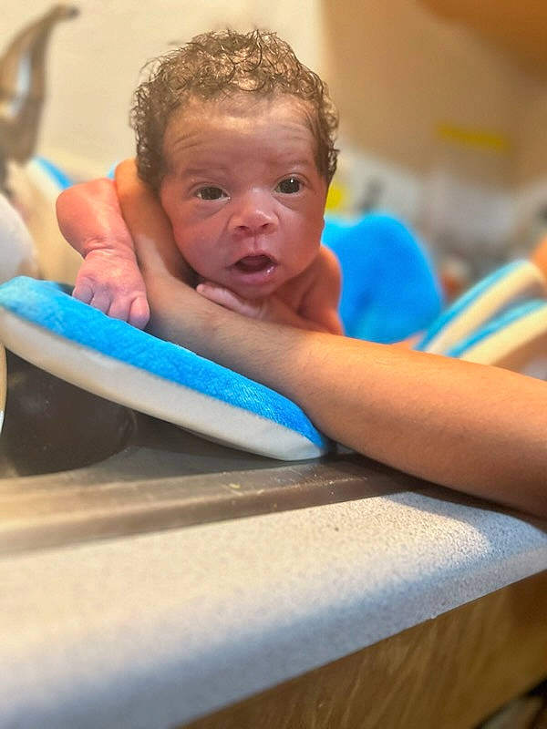 Carter joined the competition — help win amazing prizes! baby, baby_products, baby_toddler_clothing, cheek, child, chin, comfort, eye, fun, happy, leisure, person, play, recreation, room, sitting, skin, toddler, vacation, wood