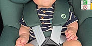 Mattía participe au concours pour gagner de l'argent avec cette photo : baby, child, car_seat, maxi_cosi, seat_belt, smile, happy, blue_eyes, striped_shirt, infant, cute, sitting, safety, legs, feet, hand, headrest, car_interior, portrait, closeup