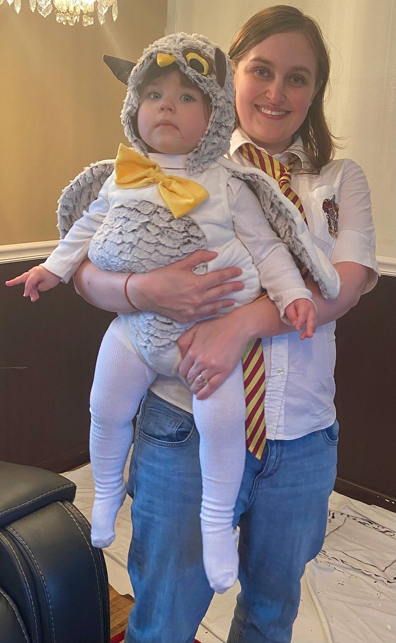 Alice is registered to the contest to win money with this photo: abdomen, automotive_tire, baby, blue, face, fashion, fun, gesture, happy, headwear, iris, jeans, joy, organ, people, person, photograph, smile, standing, tire