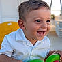 toddler, child, smile, happy, toy, green, yellow, chair, white_shirt, short_hair, portrait, indoors, hands, face, cute, playful, bright, daylight, closeup, person