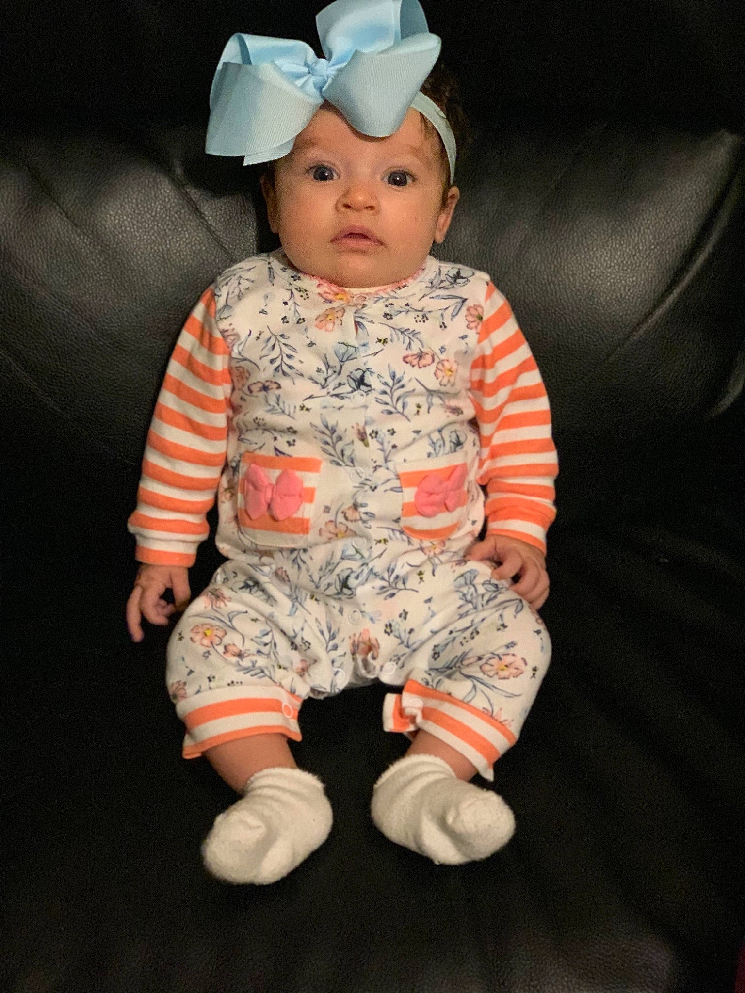 Aubreigh is registered to the contest to win money with this photo: baby, cheek, child, doll, head, headwear, person, sitting, toddler, toy