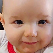 Zayden is registered to the contest to win money with this photo: adorable, baby, child, closeup, cute, dimple, expression, eyes, face, happy, head, infant, looking, person, portrait, red_trim, skin, smile, white_clothing, young