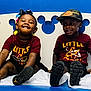 Malaysia joined the competition — help win amazing prizes! child, children, smile, happy, sitting, clothing, hat, shoes, bench, blue_background, mickey_mouse, hair_accessories, tshirt, indoor, cute, friends, playful, portrait, fun, kids