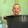 Lorenzo joined the competition — help win amazing prizes! child, toddler, baby, bathtub, plastic_bucket, smiling, happy, face, ears, hand, water_droplet, chin, green_wall, outdoor, portrait, container, candid, playtime, cute, bath_time