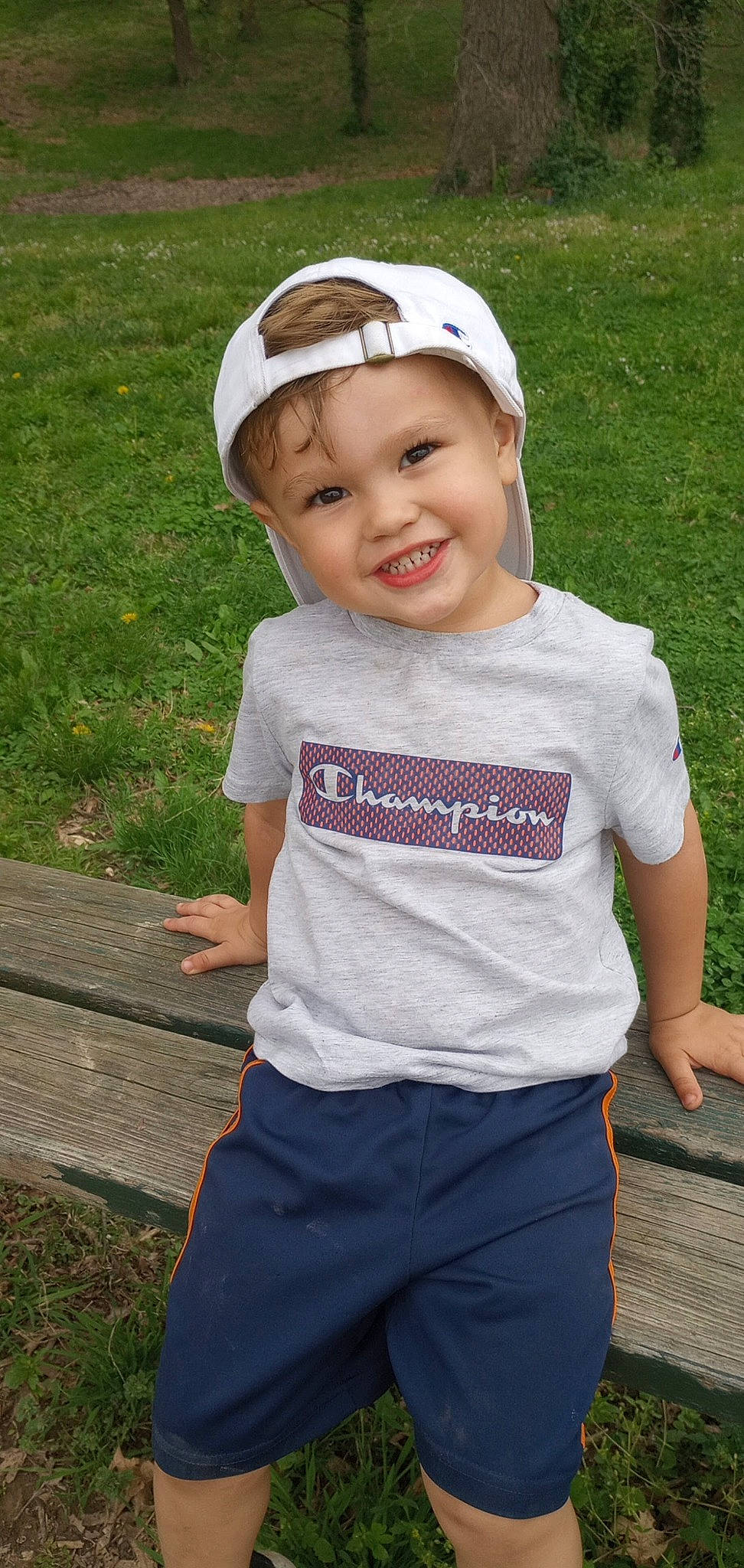 Brax joined the competition — help win amazing prizes! baby_toddler_clothing, baseball_cap, cap, child, eye, face, fashion_accessory, fun, goggles, grass, happy, head, headgear, headwear, joy, magenta, pattern, person, pink, sleeve