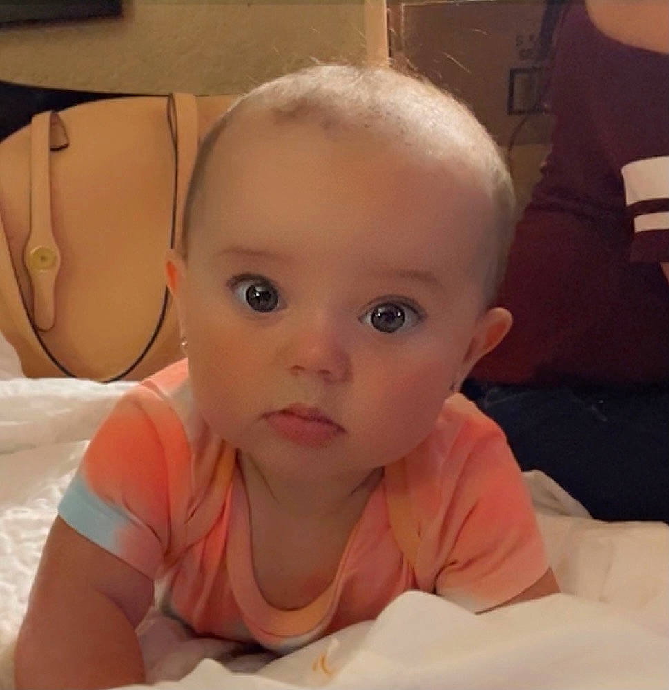 Nyomi joined the competition — help win amazing prizes! baby, cheek, comfort, ear, eyelash, finger, happy, human_body, iris, lip, mouth, nail, neck, nose, person, sitting, skin, smile, thumb, toddler