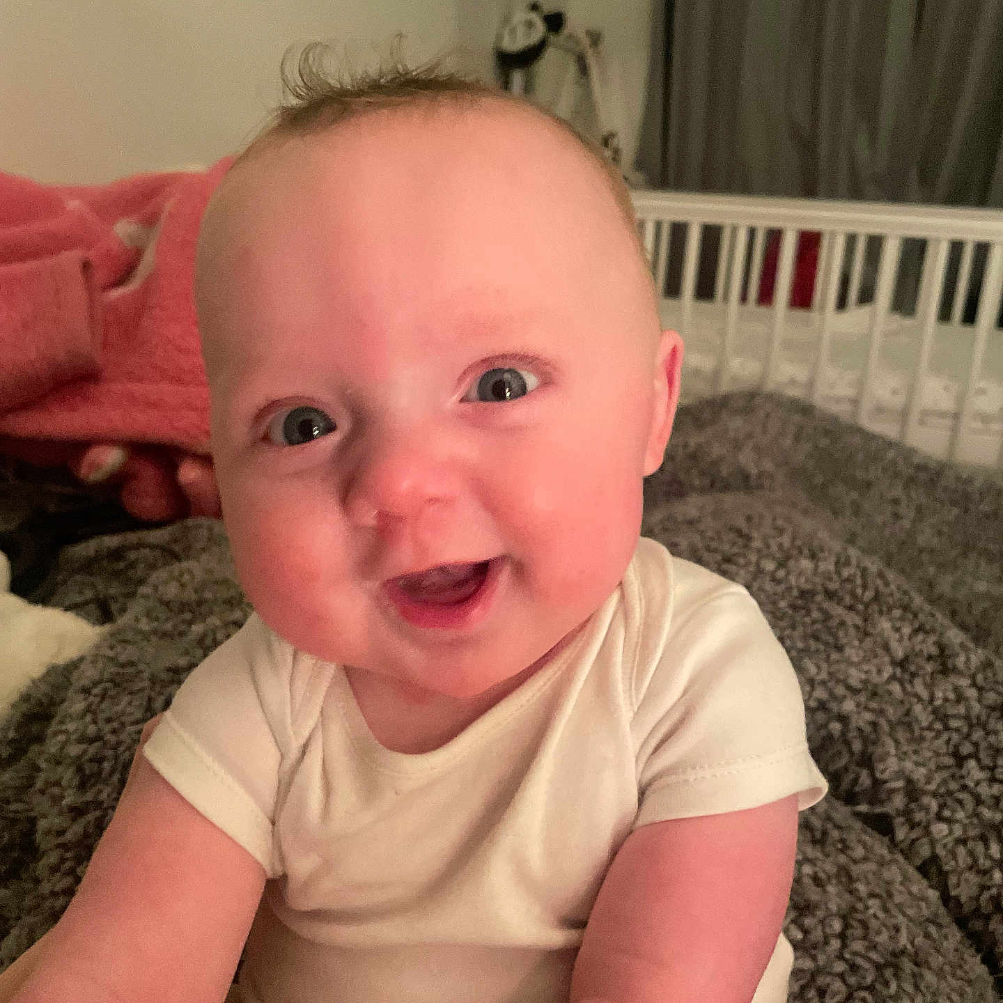 Arlo is registered to the contest to win money with this photo: baby, babylaughing, bed, clothing, couch, crib, cushion, face, furniture, happy, head, homedecor, indoors, infantbed, laughing, person, photography, portrait, smile, t_shirt
