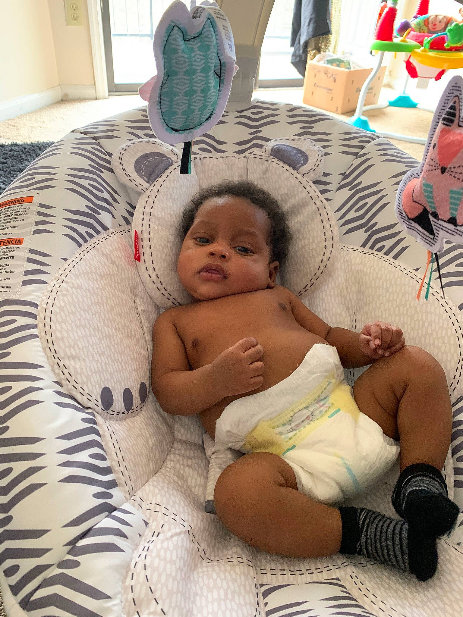 Javon is registered to the contest to win money with this photo: baby, birth, child, comfort, furniture, linens, person, room, textile, toddler