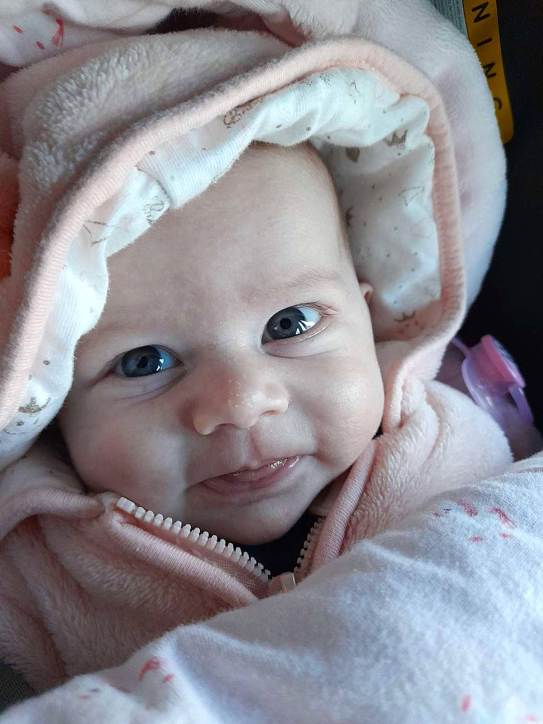 Lena participe au concours pour gagner de l'argent avec cette photo : baby, baby_products, baby_toddler_clothing, bonnet, cheek, child, close_up, eyebrow, flesh, iris, linens, lip, nose, organ, person, photography, portrait_photography, skin, textile, toddler