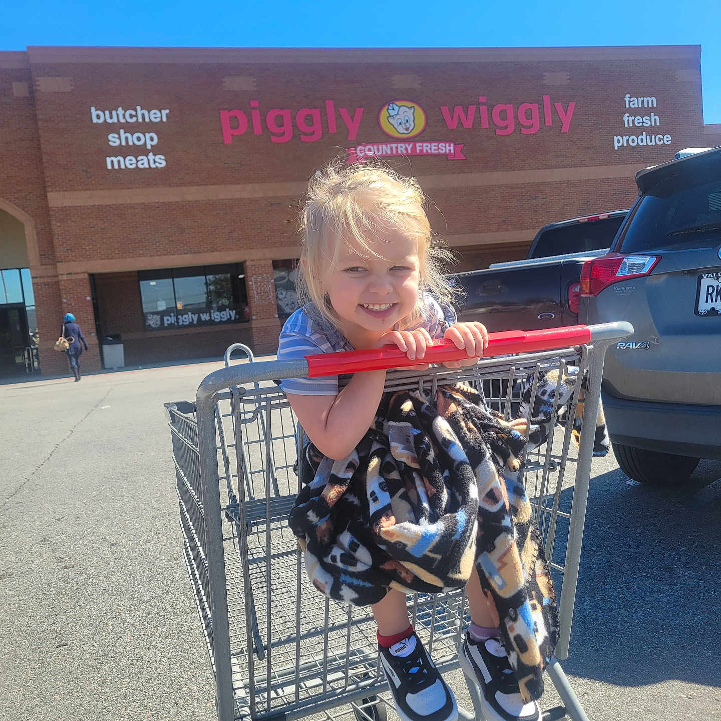 Delila is registered to the contest to win money with this photo: alloywheel, car, carwheel, child, clothing, face, female, footwear, girl, head, machine, person, photography, portrait, shoe, shoppingcart, spoke, transportation, vehicle, wheel