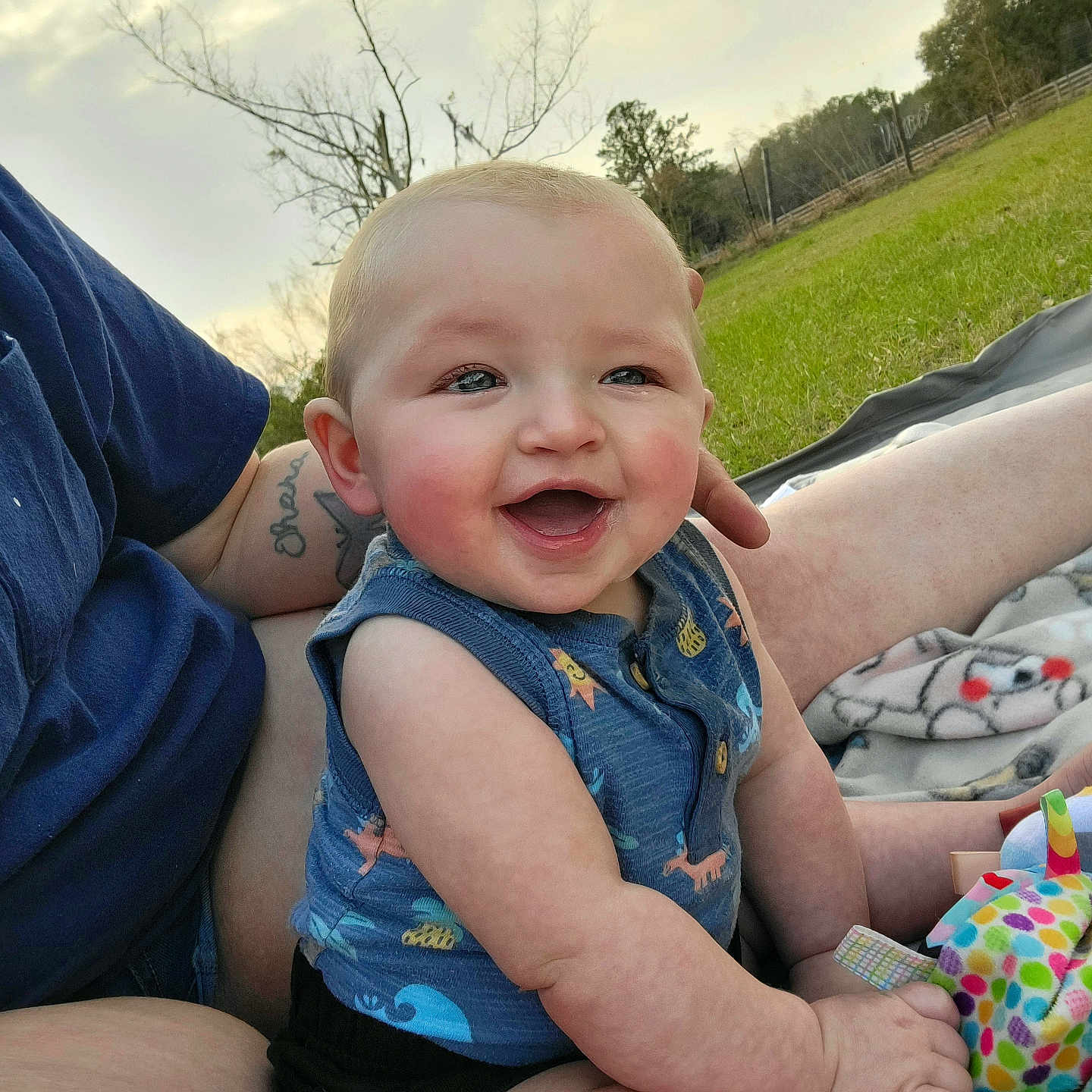 Leticia joined the competition — help win amazing prizes! baby, clothing, face, grass, happy, head, jeans, laughing, nature, outdoors, pants, park, person, photography, plant, portrait, shorts, smile, t_shirt, tree