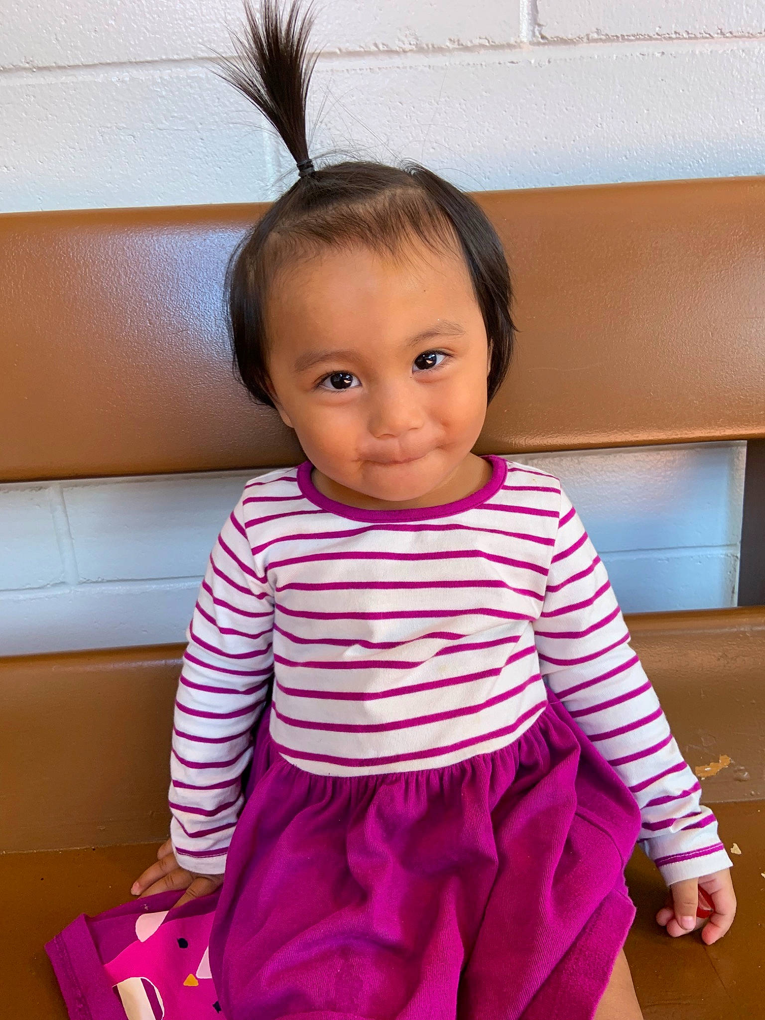 Rebel Kealohilani Sachie Shook is registered to the contest to win money with this photo: baby, baby_toddler_clothing, child, child_model, dress, face, magenta, person, pink, skin, sleeve, toddler
