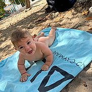 Dariel Frontela joined the competition — help win amazing prizes! baby, towel, beach, sand, smiling, child, outdoor, sunlight, happy, barefoot, summer, nature, playful, person, daytime, trees, vacation, relaxation, skin, expression