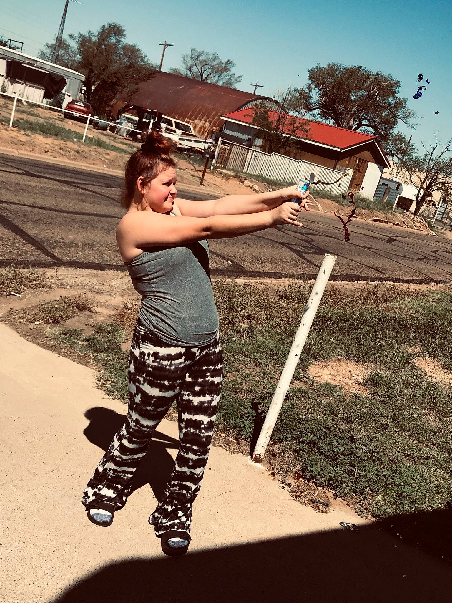 Zoe Nolen is registered to the contest to win money with this photo: balance, boot, cool, flash_photography, fun, grass, happy, human, human_leg, landscape, leisure, people_in_nature, person, plant, recreation, sky, sneakers, standing, tints_and_shades, tree