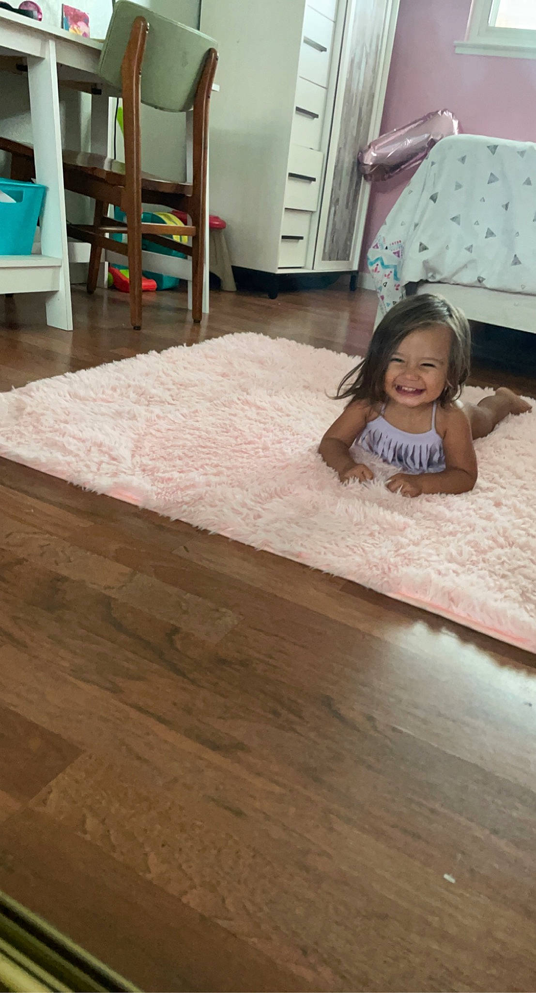 Freya is registered to the contest to win money with this photo: baby_toddler_clothing, comfort, drawer, floor, flooring, furniture, hardwood, house, joy, laminate_flooring, leisure, pattern, person, property, smile, table, textile, toddler, varnish, wall