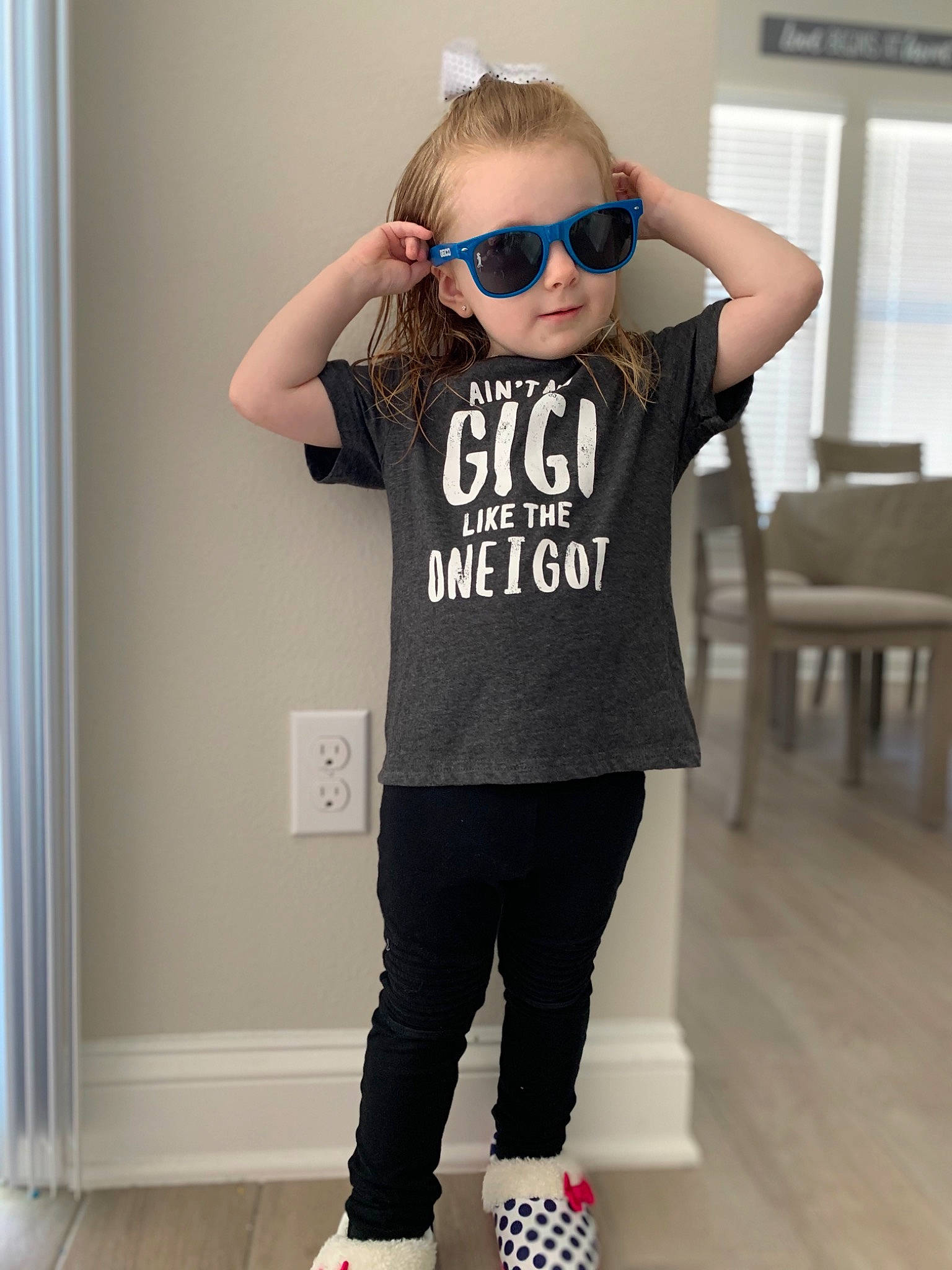 Alyson joined the competition — help win amazing prizes! blue, child, child_model, clothing, cool, eyewear, footwear, glasses, headwear, long_sleeved_t_shirt, male, muscle, neck, outerwear, person, shoe, shoulder, sleeve, sportswear, t_shirt