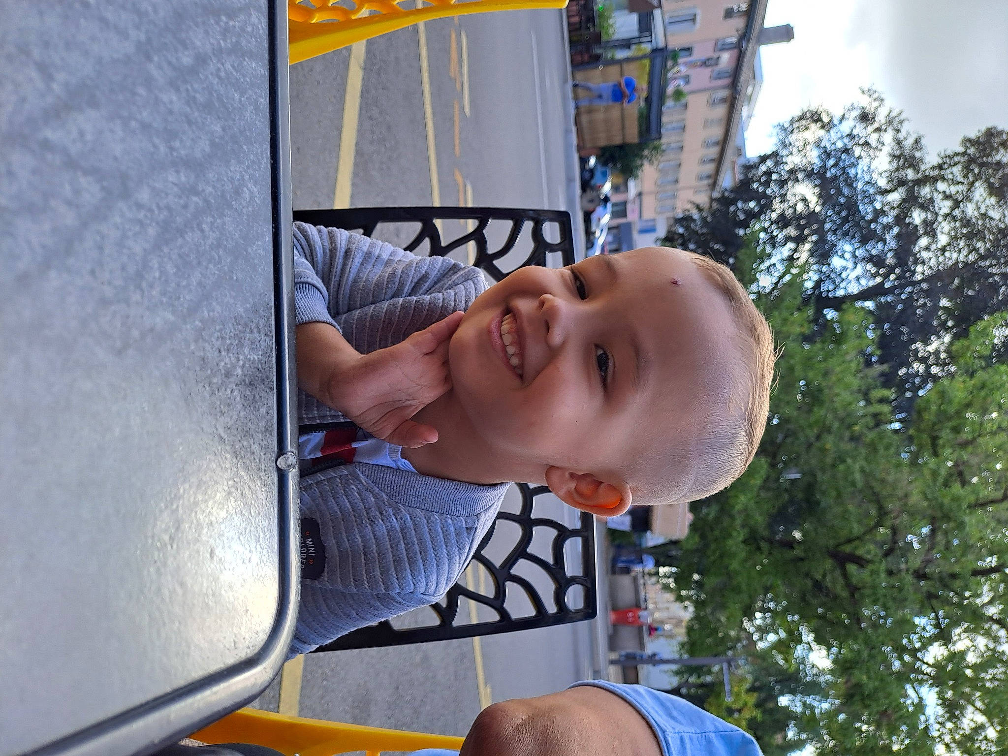 Anthonio participe au concours pour gagner de l'argent avec cette photo : auto_part, automotive_exterior, automotive_wheel_system, city, cloud, eyewear, fun, grass, happy, hat, joy, leisure, motor_vehicle, outdoor_play_equipment, person, recreation, sky, smile, t_shirt, toddler