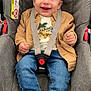 Maylan participe au concours pour gagner de l'argent avec cette photo : baby, barefoot, car_seat, casual, child, clothing, cute, face, floor, happy, indoor, infant, jacket, jeans, person, portrait, safety, seatbelt, smiling, toddler