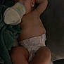 Maylan participe au concours pour gagner de l'argent avec cette photo : baby, bed, blanket, bottle, child, comfort, cute, diaper, foot, hand, indoors, infant, nap, peaceful, person, relaxation, resting, skin, sleeping, toddler