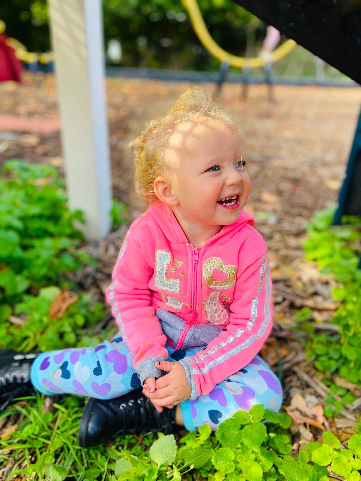 Melodie joined the competition — help win amazing prizes! baby, baby_toddler_clothing, child, fun, garden, grass, happy, joy, lawn, leaf, leisure, nature, people_in_nature, person, pink, plant, recreation, sitting, smile, summer
