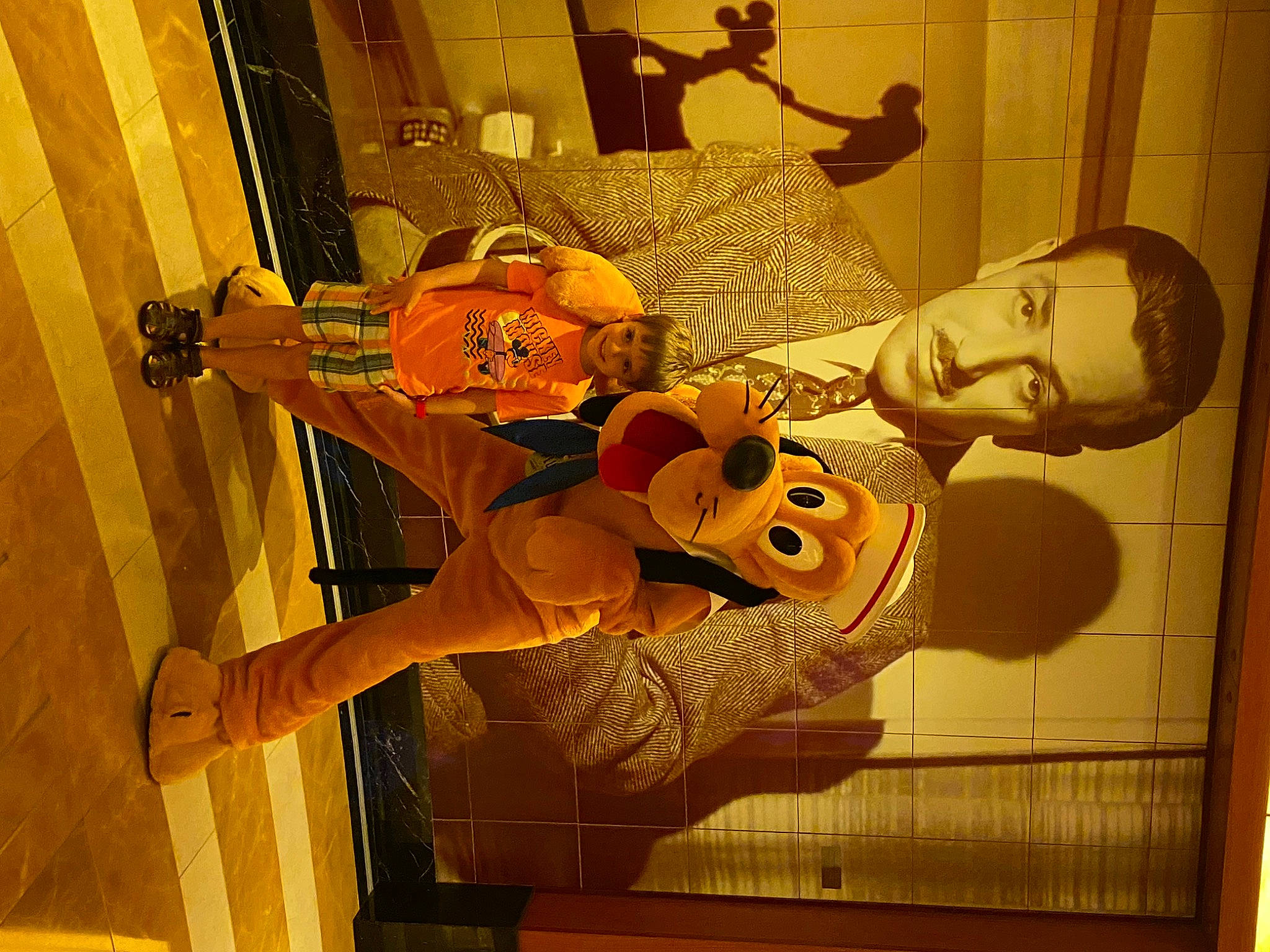 Elijah is registered to the contest to win money with this photo: art, fun, hat, joy, orange, person, room, visual_arts, window, wood