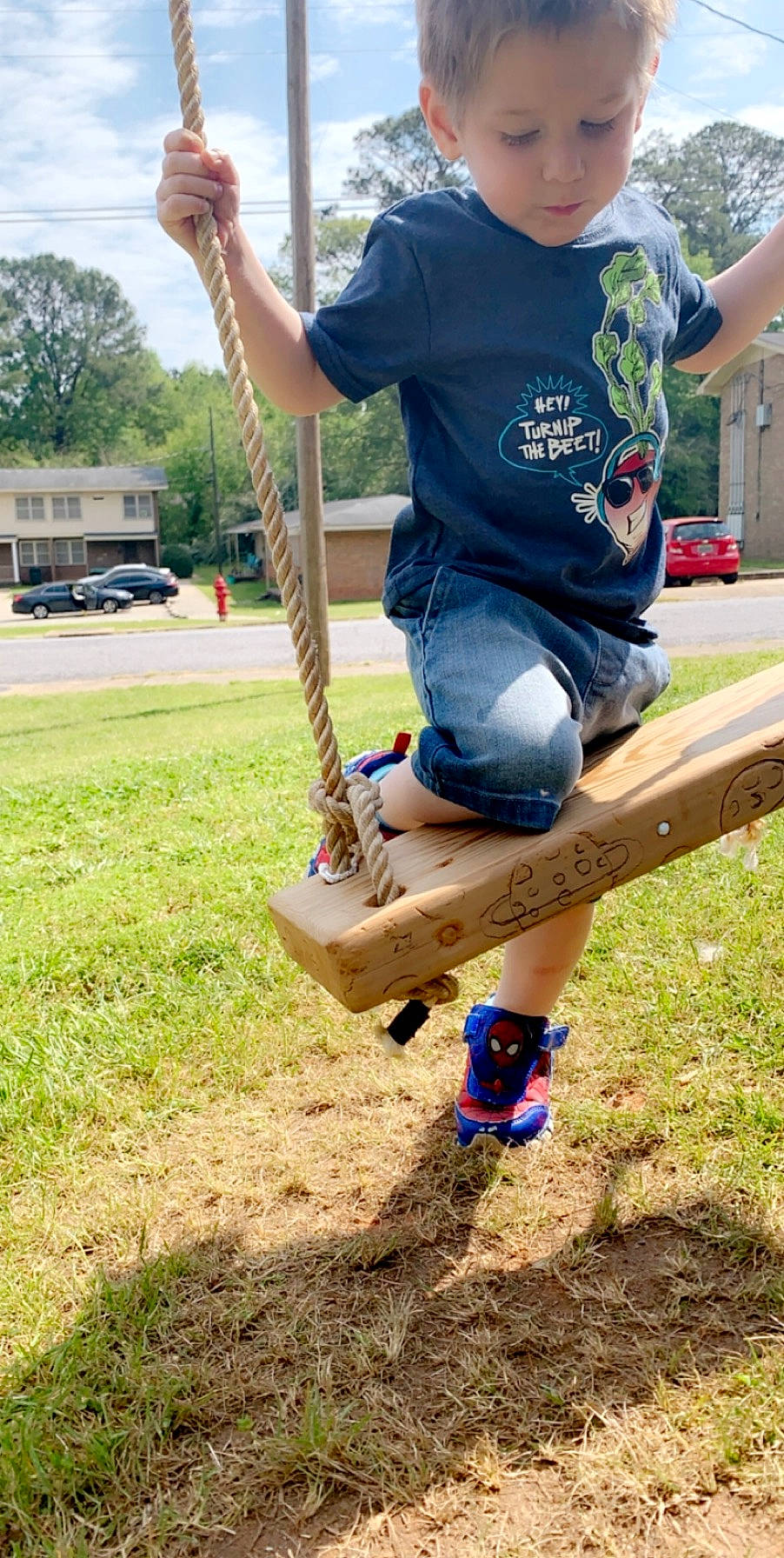 Cayden is registered to the contest to win money with this photo: child, fun, outdoor_play_equipment, person, play, playground, public_space, recreation, soil, swing, tree