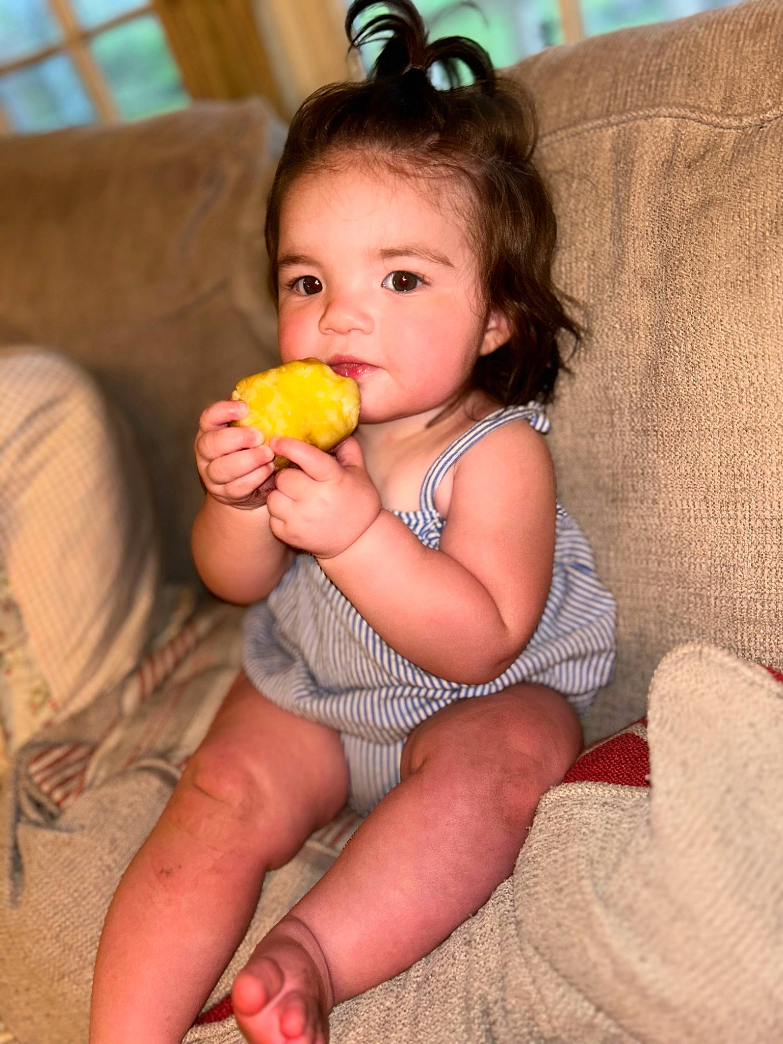 Brinley is registered to the contest to win money with this photo: baby, baby_toddler_clothing, cheek, eye, face, finger, fruit, gesture, hair, hand, happy, head, iris, lip, neck, nose, person, skin, tableware, thumb