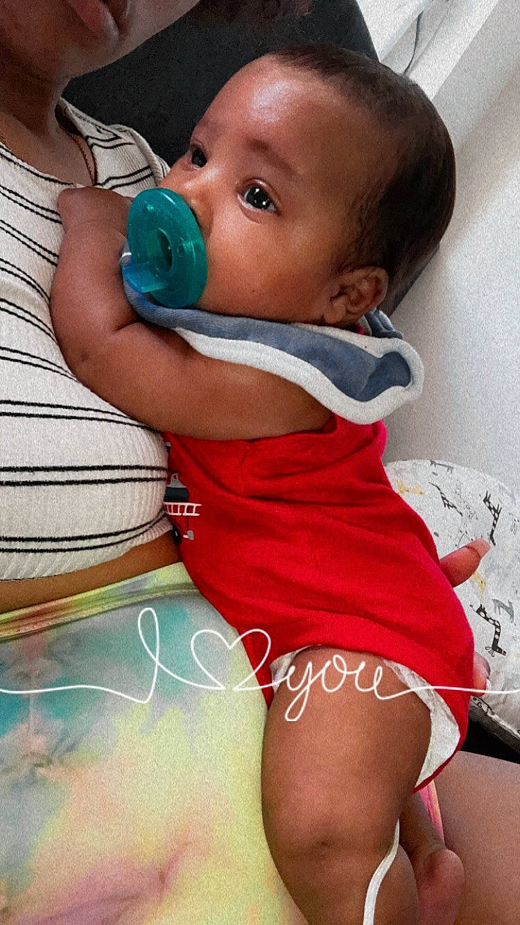 Jamal joined the competition — help win amazing prizes! arm, baby, baby_toddler_clothing, cheek, drinkware, eye, eyelash, face, finger, hand, happy, human_body, iris, lip, mouth, nose, organ, person, skin, sleeve