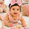 Adrianna is registered to the contest to win money with this photo: baby, infant, girl, pink_bow, headband, smiling, wooden_toys, carpet, teddy_bear, indoor, cute, happy, child, playtime, soft_lighting, home_decor, floral_dress, closeup, portrait, toy_blocks