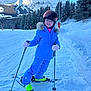 child, skiing, snow, mountain, winter, blue_jacket, ski_poles, helmet, gloves, pine_trees, ski_boots, snowy_slope, outdoor, smiling, cold_weather, recreation, snow_sports, nature, clear_sky, person