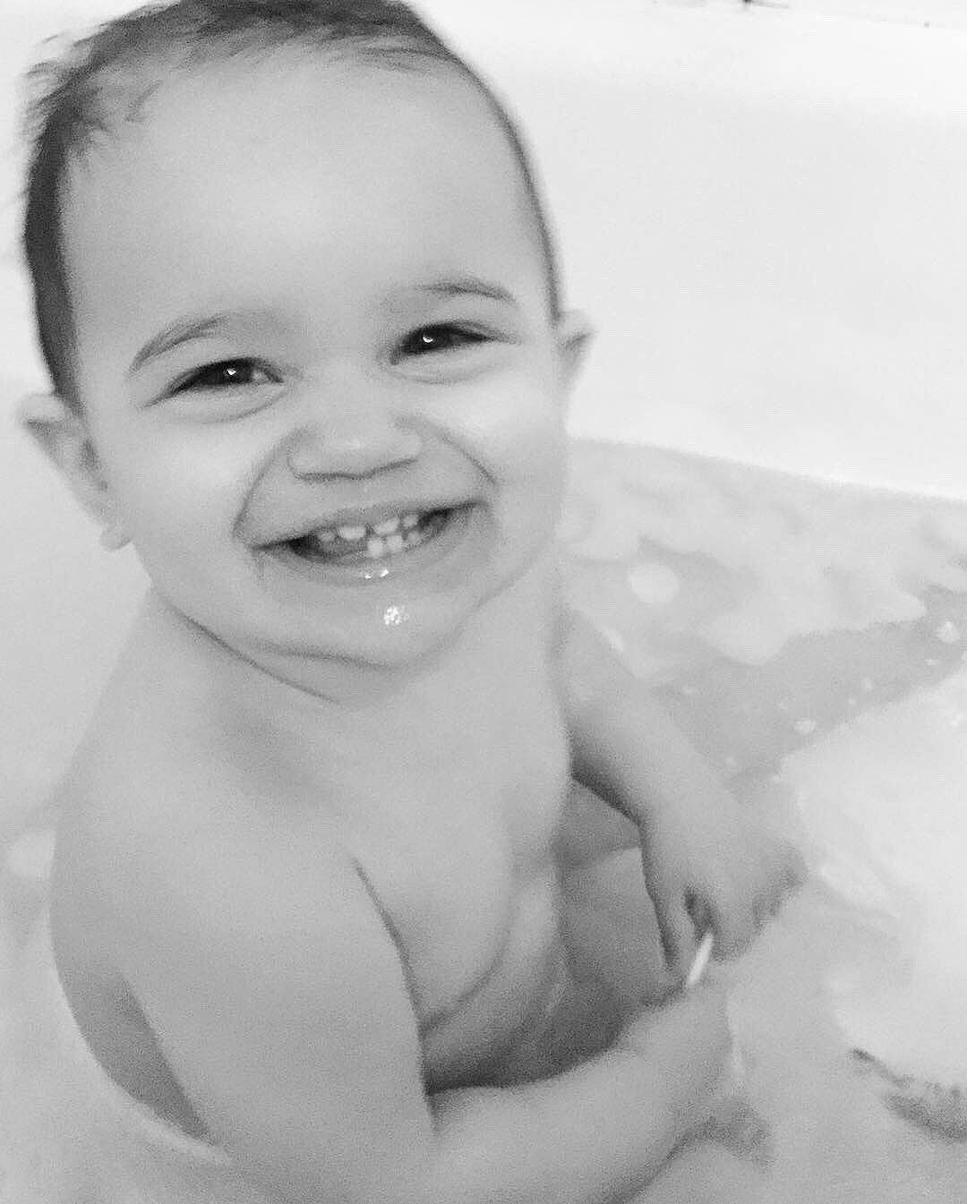 Lailani joined the competition — help win amazing prizes! baby, bathing, black, black_and_white, cheek, child, chin, eye, eyebrow, face, facial_expression, head, joy, lip, monochrome, monochrome_photography, nose, person, photograph, skin