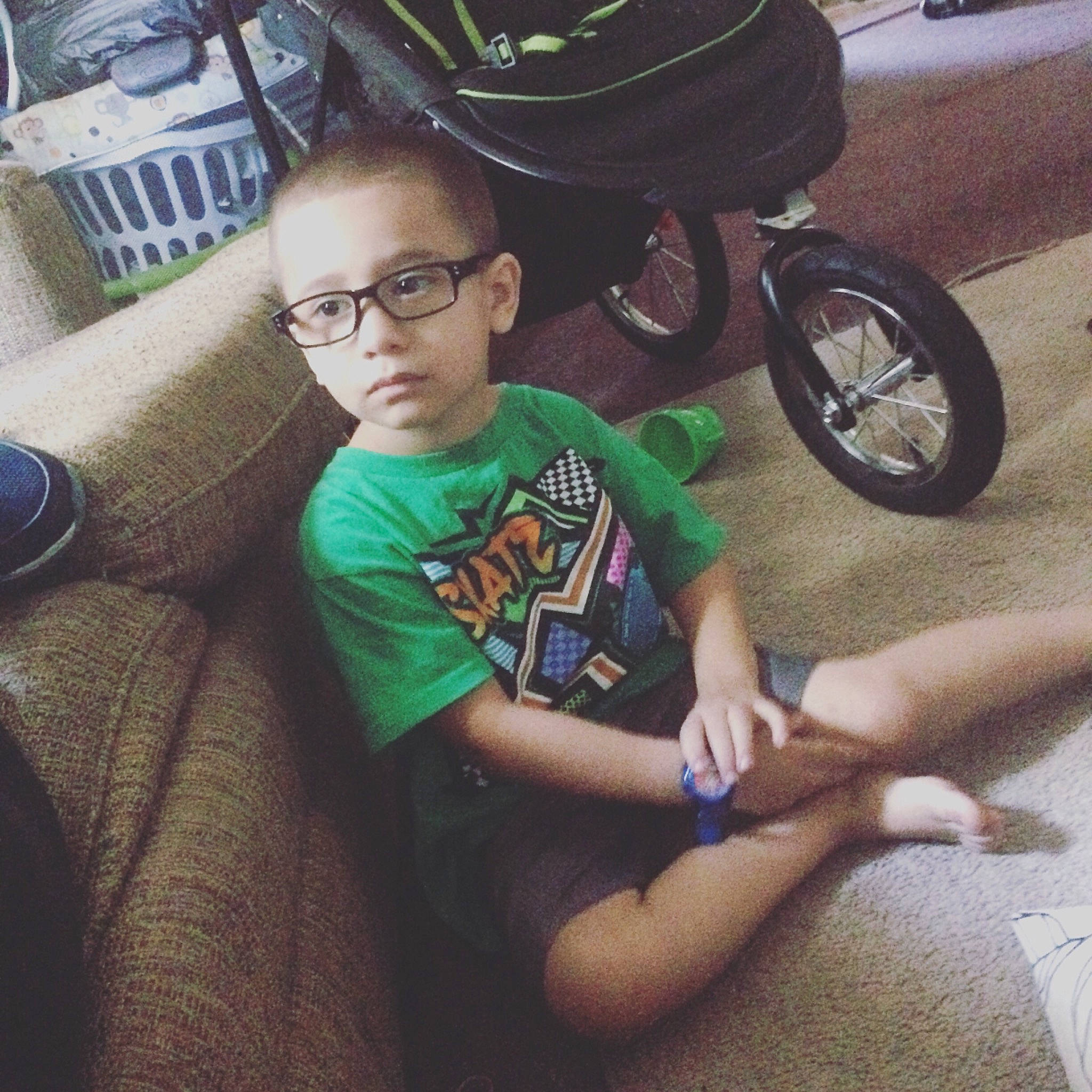 Gabriel is registered to the contest to win money with this photo: bicycle, bicycle_drivetrain_part, bicycle_motocross, bicycle_part, bicycle_wheel, bmx_bike, child, cool, eyewear, glasses, hand, person, photography, recreation, selfie, sitting, smile, t_shirt, vehicle, wheel