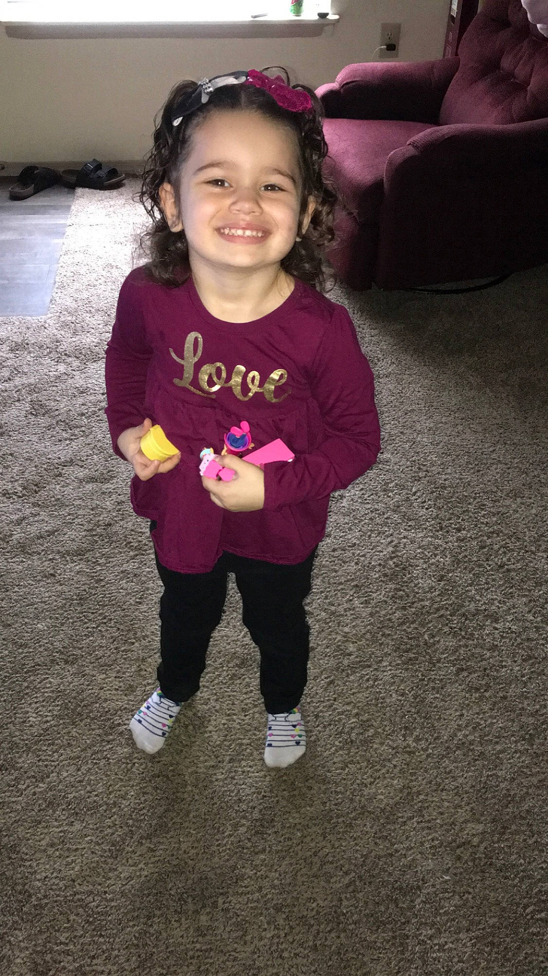 Lailani is registered to the contest to win money with this photo: baby_toddler_clothing, cheek, clothing, cool, eye, fun, hairstyle, happy, head, human_body, iris, joy, magenta, outerwear, person, pink, purple, skin, sleeve, smile