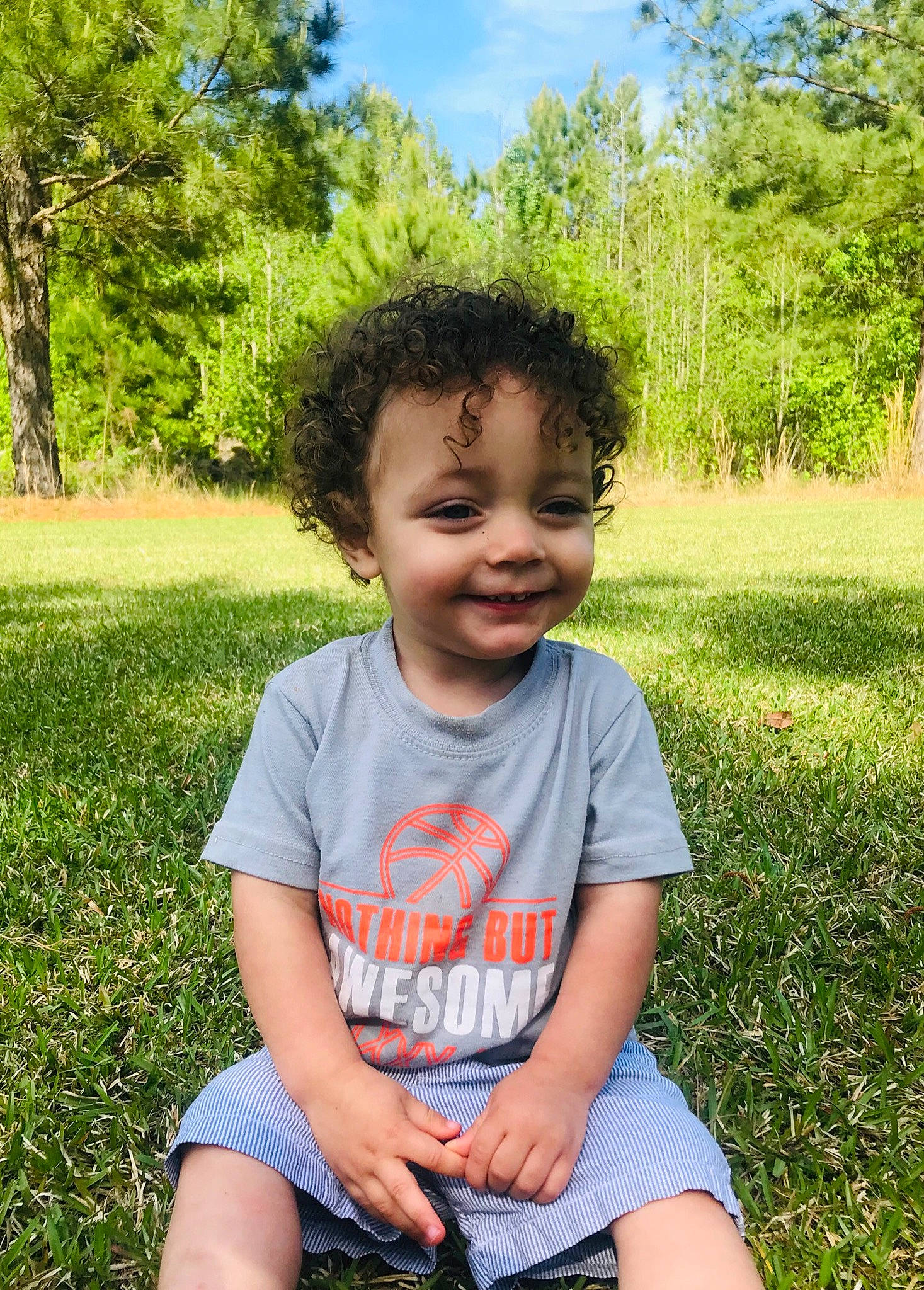 Konnor joined the competition — help win amazing prizes! child, eye, facial_expression, fun, garden, grass, happy, joy, lawn, leaf, leisure, male, people, person, photography, plant, sitting, smile, summer, toddler