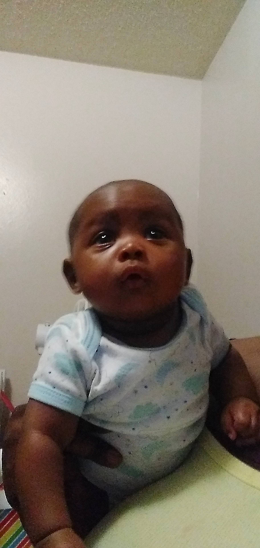 Akyrin is registered to the contest to win money with this photo: baby, cheek, chin, comfort, elbow, eyebrow, eyelash, forehead, fun, gesture, happy, iris, jaw, lip, mouth, nose, person, skin, sleeve, thumb