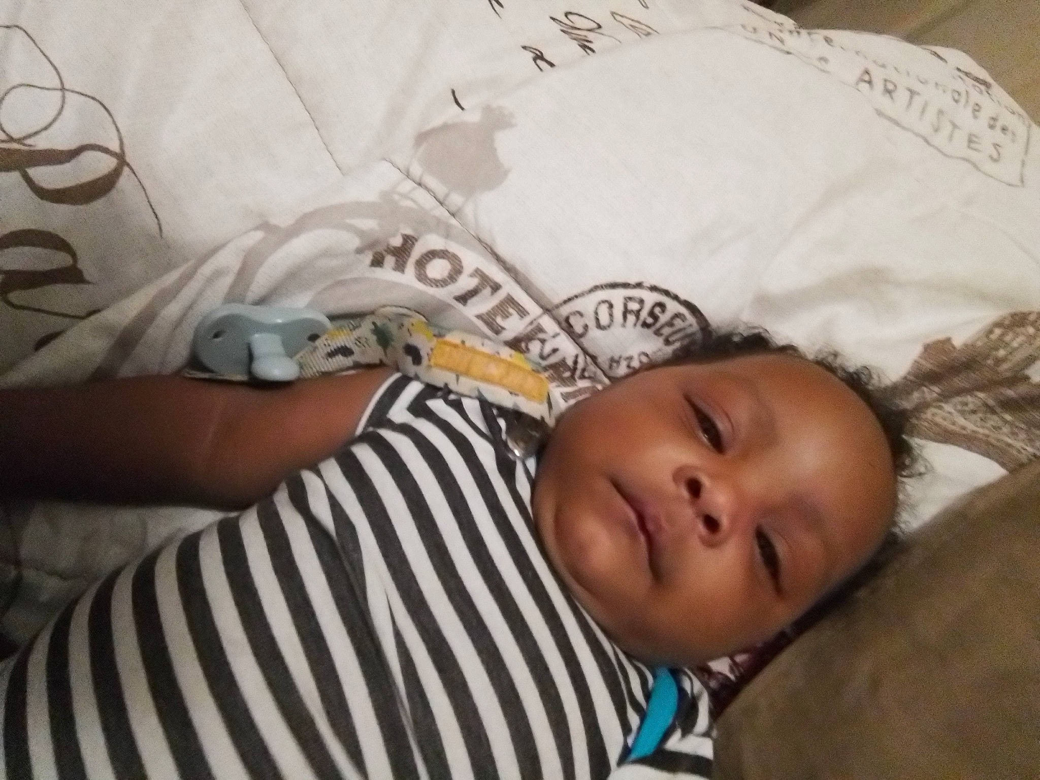 Kareem joined the competition — help win amazing prizes! baby, baby_products, baby_toddler_clothing, bedding, bedtime, cheek, child, comfort, eyebrow, linens, nap, pattern, person, room, sleep, sleeve, textile, toddler