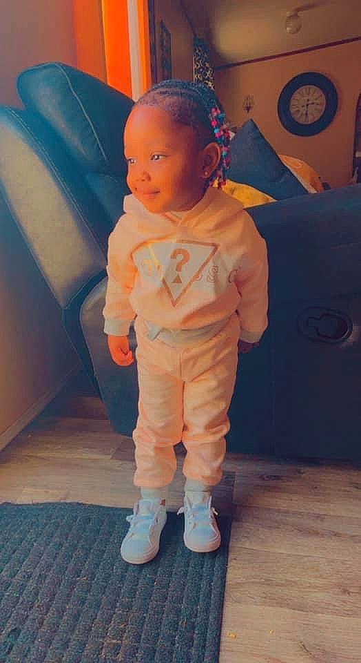 Makenzie is registered to the contest to win money with this photo: baby, baby_toddler_clothing, boot, chair, child, couch, electric_blue, floor, flooring, fun, leisure, orange, peach, person, personal_protective_equipment, play, pumpkin, room, sitting, toddler