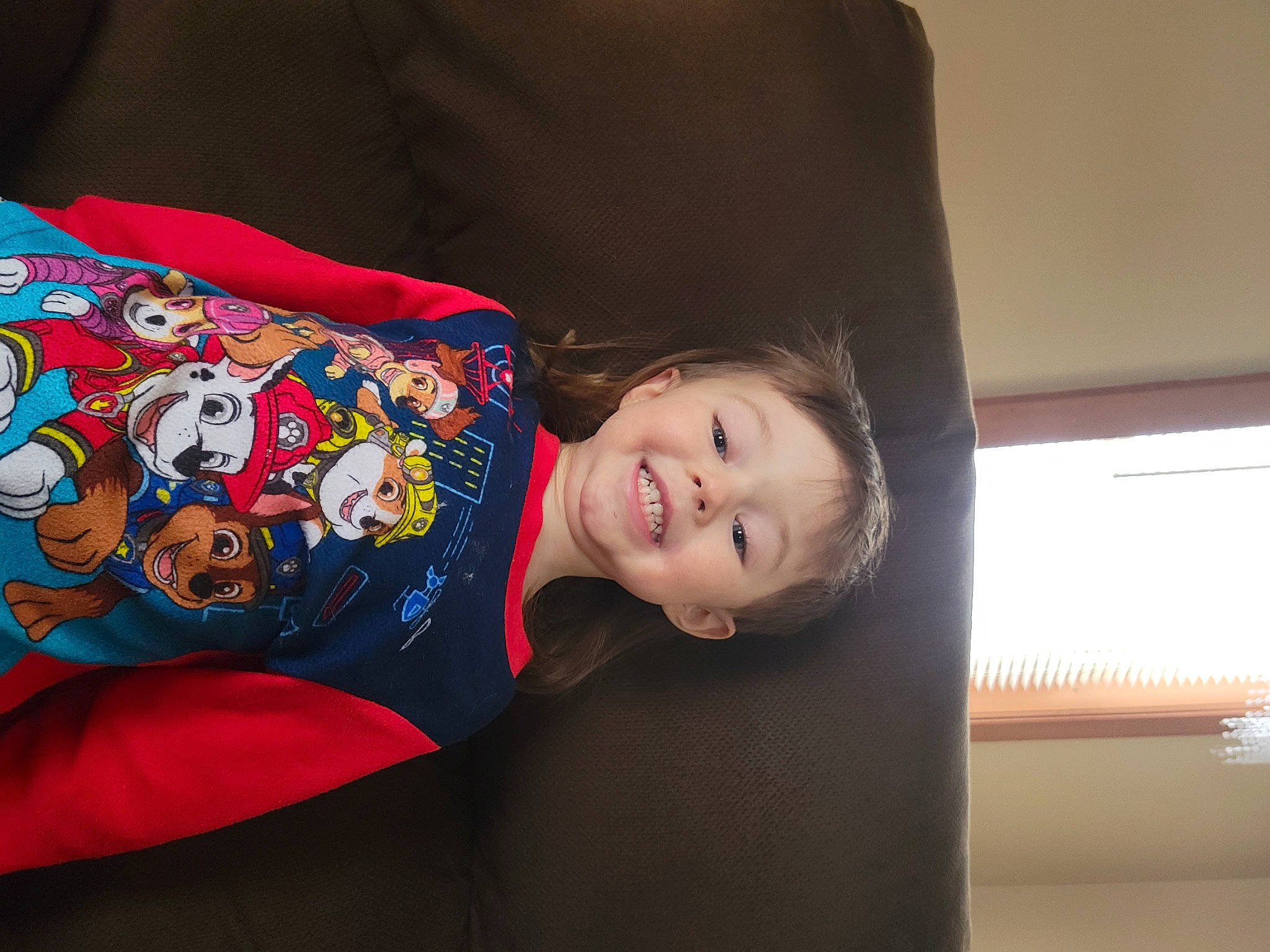 Jameson is registered to the contest to win money with this photo: baby, baby_products, baby_toddler_clothing, carmine, child, comfort, fictional_character, flooring, happy, human_body, joy, linens, pattern, person, room, sitting, sleeve, smile, t_shirt, toddler