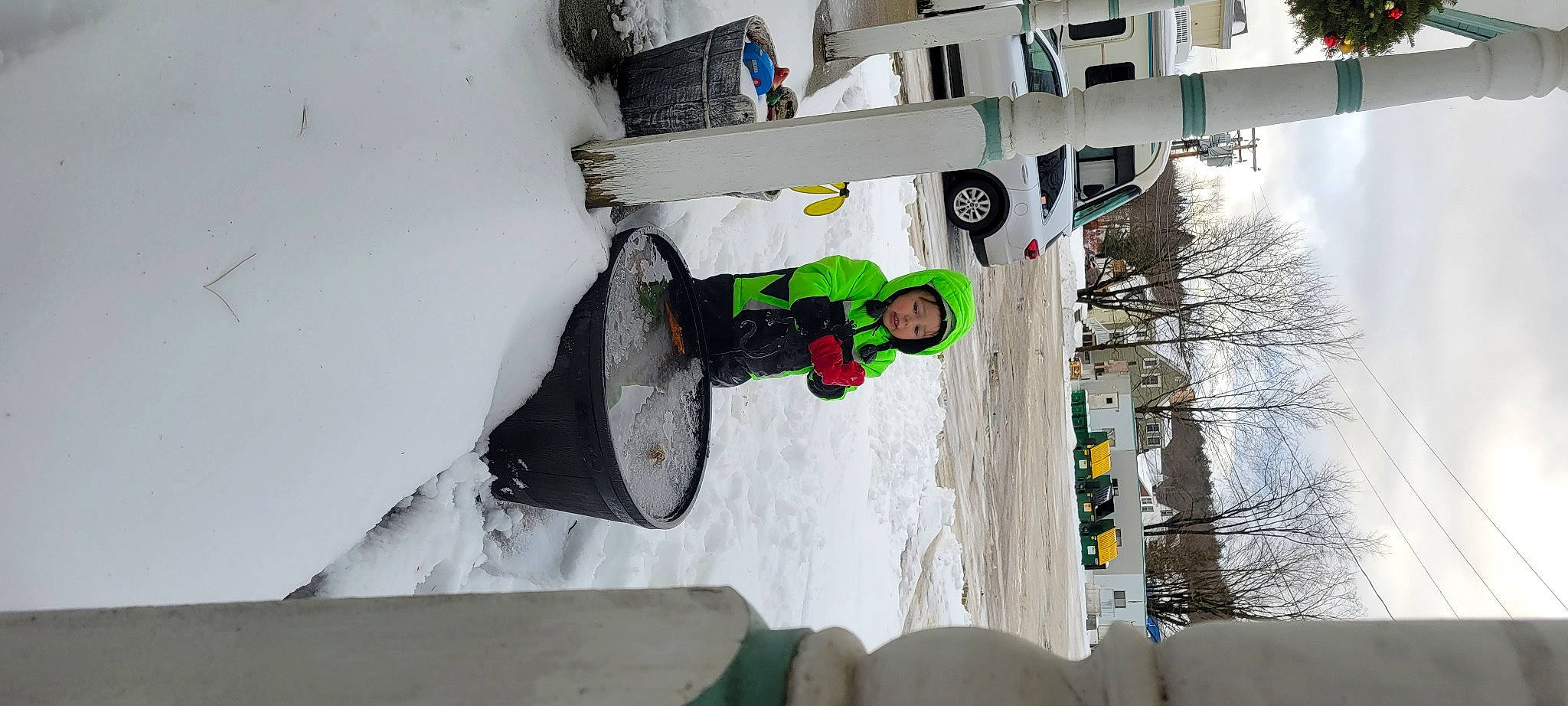 Jameson is registered to the contest to win money with this photo: automotive_tire, building, car, concrete, door, event, freezing, gas, headwear, machine, person, recreation, room, sky, slope, snow, tire, tree, vehicle, wheel